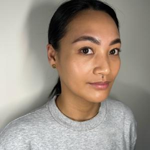 Close-up of perfectly shaped eyebrows after a tint and wax by Angelina in Auckland.